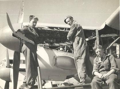 Airmen working on the Merlin engine of an 82 Sqn Lancaster