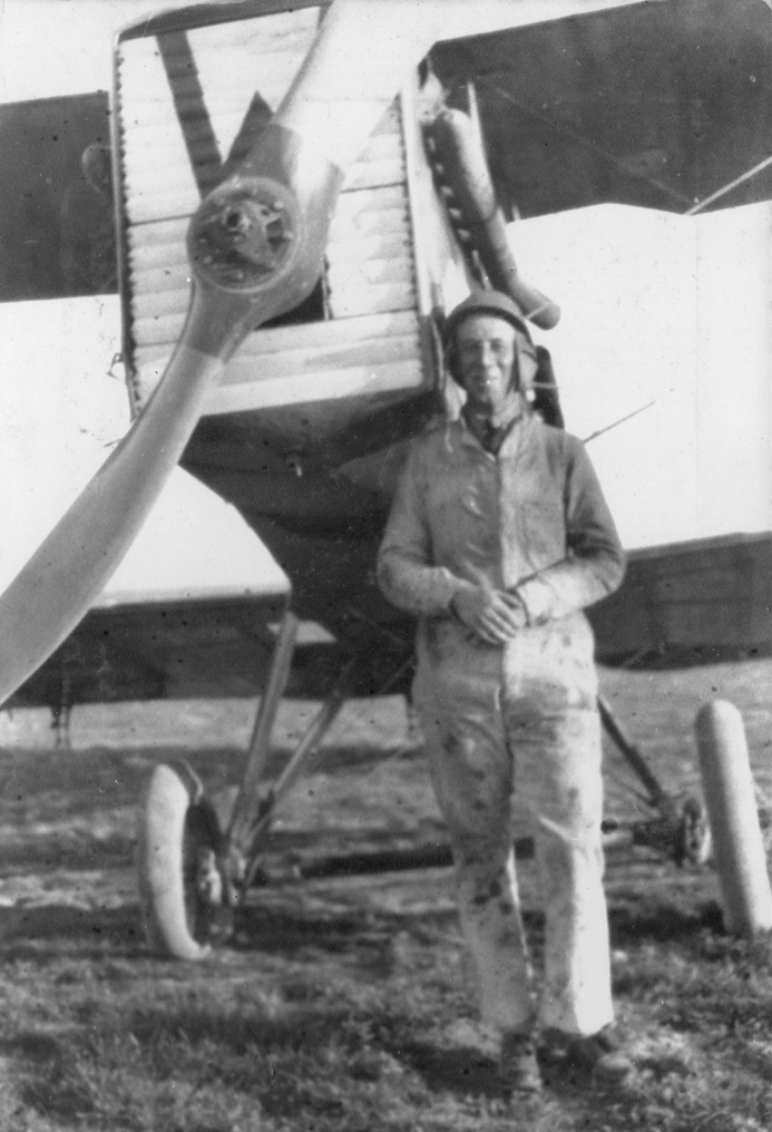 An unknown pilot or airman in front of a DH9A of an unknown squadron